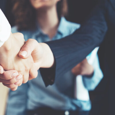 featured photo business shaking hands industry hiring jobs teamwork