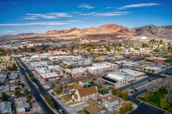 Downtown Boulder City – A small-town setting with historic buildings, a mountain backdrop, and a wide aerial view of the streets.