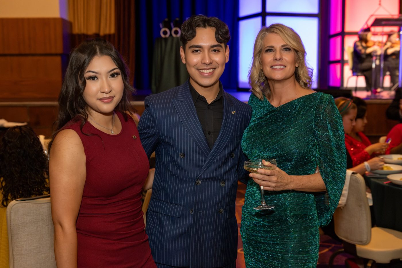 LVGEA intern Kevin Osario Hernandez posing with other members of the LVGEA team at the Colors Gala
